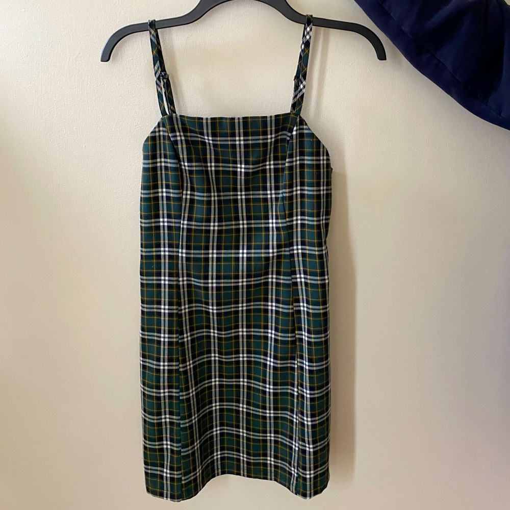 Empyre, green plaid dress.